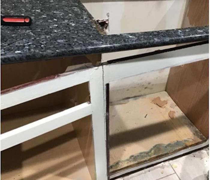 Kitchen Cabinet and Equipment Water Damage