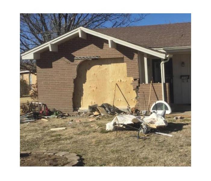 home damaged by storm in texas